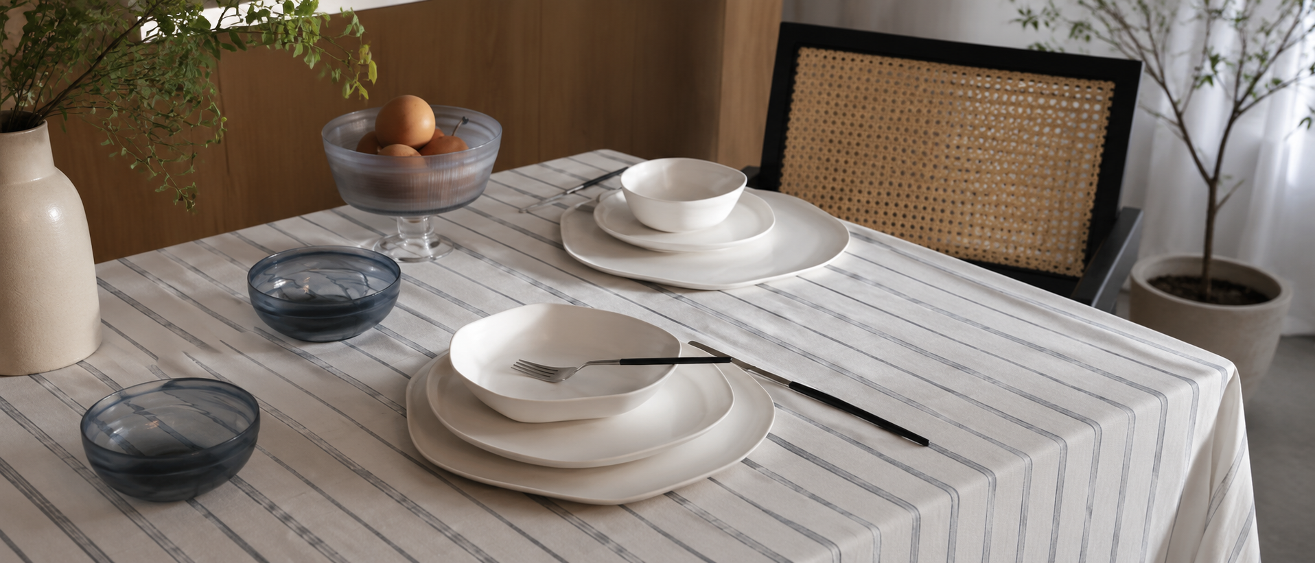 Modern tableware arranged on a dining table